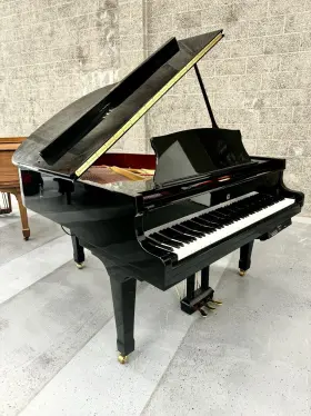 DG152 STORY CLARK Baby Piano Player Ebony