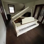 Wurlitzer Baby Grand Piano. Fixed Price $2500.00.