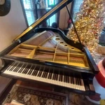 Yamaha Conservatory Grand Piano 73". Fixed Price $7950.00.