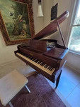 Chickering & Sons Baby Grand Piano - Art Deco Style In Mahogany. Fixed Price $12000.00.