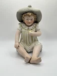 Antique Bisque Piano Baby Young Girl In Green Hat. Fixed Price $29.99.