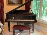 Young Chang Baby Grand Piano With Bench. Fixed Price $4000.00.