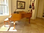 5'8" Grand Piano. Fixed Price $2500.00.