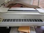 Samick Baby Grand Piano. Fixed Price $4000.00.