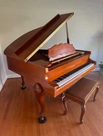 Samick Cherry Baby Grand Piano And Bench. Fixed Price $1995.00.