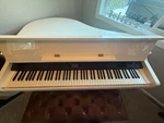 Samick Digital Baby Grand Piano Sxp511. Fixed Price $2000.00.