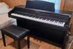 Kawai 88-key Digital Home Piano, Black, Includes Bench And Three Pedals. Fixed Price $875.00.